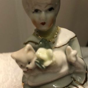 “Vintage “ Lady holding kitten.